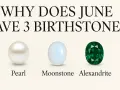 Three June 30th birthstones: a pearl, a moonstone, and an emerald-cut alexandrite.