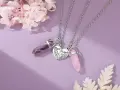 Two necklaces with amethyst and rose quartz crystals, symbolizing the enduring bond of friendship.
