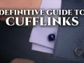 A close-up of a man's suit sleeve shows a blue lapis lazuli cufflink. This image is part of a definitive guide to cufflinks.