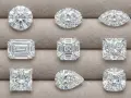 Nine sparkling diamonds, each with a unique diamond cut: round, oval, marquise, emerald, Asscher, pear, princess, and cushion.