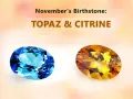 Two oval gemstones, a vibrant blue topaz and a warm citrine, represent November's birthstone.