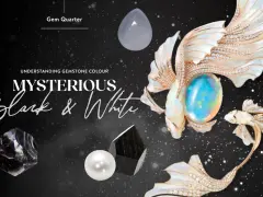 Mysterious black and white gemstone collection, featuring a pearl, obsidian, and a pear-shaped chalcedony.