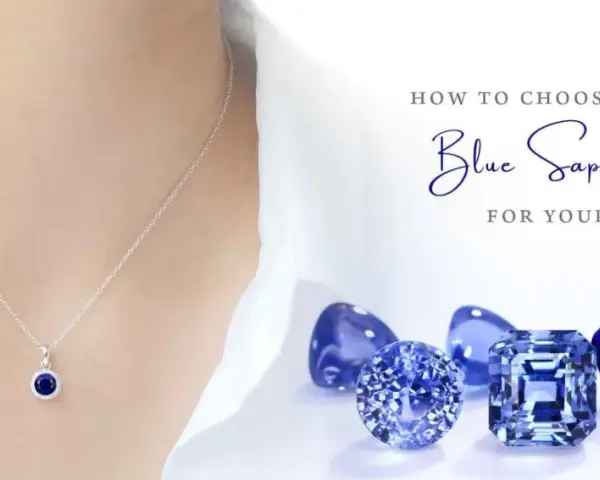 A delicate necklace with a blue sapphire pendant is shown alongside loose blue sapphire stones, illustrating how to choose the perfect gemstone for your jewelry.