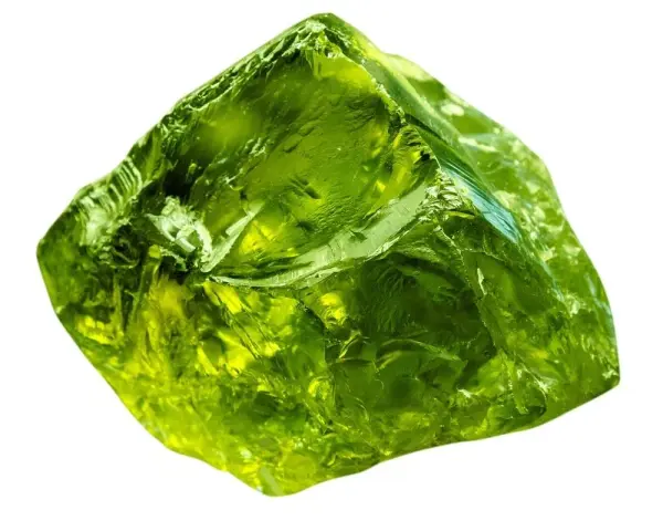 A rough, translucent green crystal, like an emerald, represents growth, renewal, and prosperity.