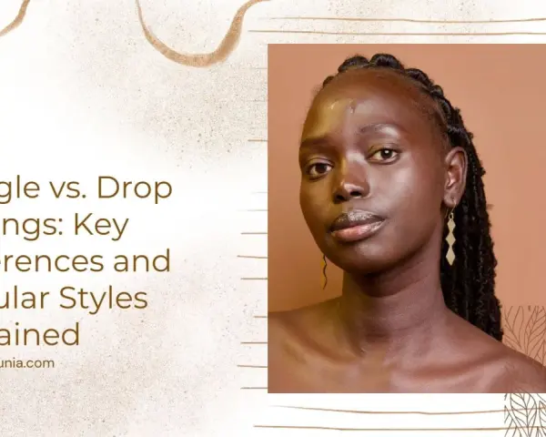 A woman models geometric drop earrings, showcasing how these elegant pieces hang below the earlobe.