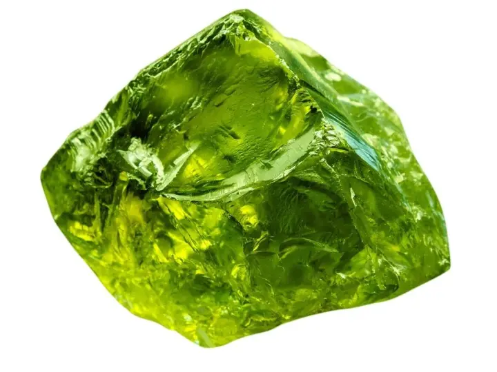 A rough, translucent green crystal, like an emerald, represents growth, renewal, and prosperity.